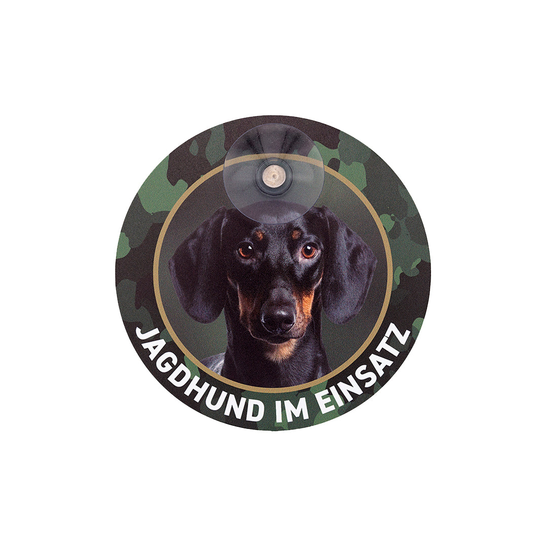 Rundes Dackelschild für die Autoscheibe mit Kurzhaardackel, Teckel Motiv und der Aufschrift Jagdhund im Einsatz