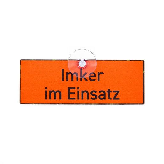 Imker Schild in Signalfarbe mit der Aufschrift "Imker im Einsatz" und Saugnapf für die Autoscheibe