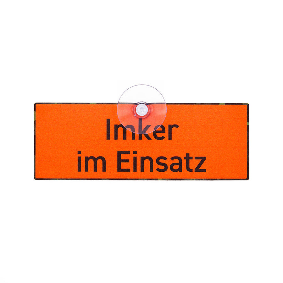 Imker Schild in Signalfarbe mit der Aufschrift "Imker im Einsatz" und Saugnapf für die Autoscheibe